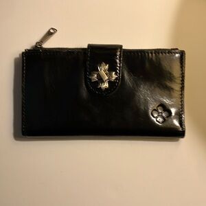 Patricia Nash black patent leather Marene floret twist lock wallet.